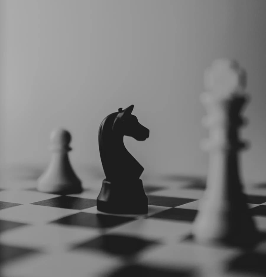 Black pieces on a chessboard